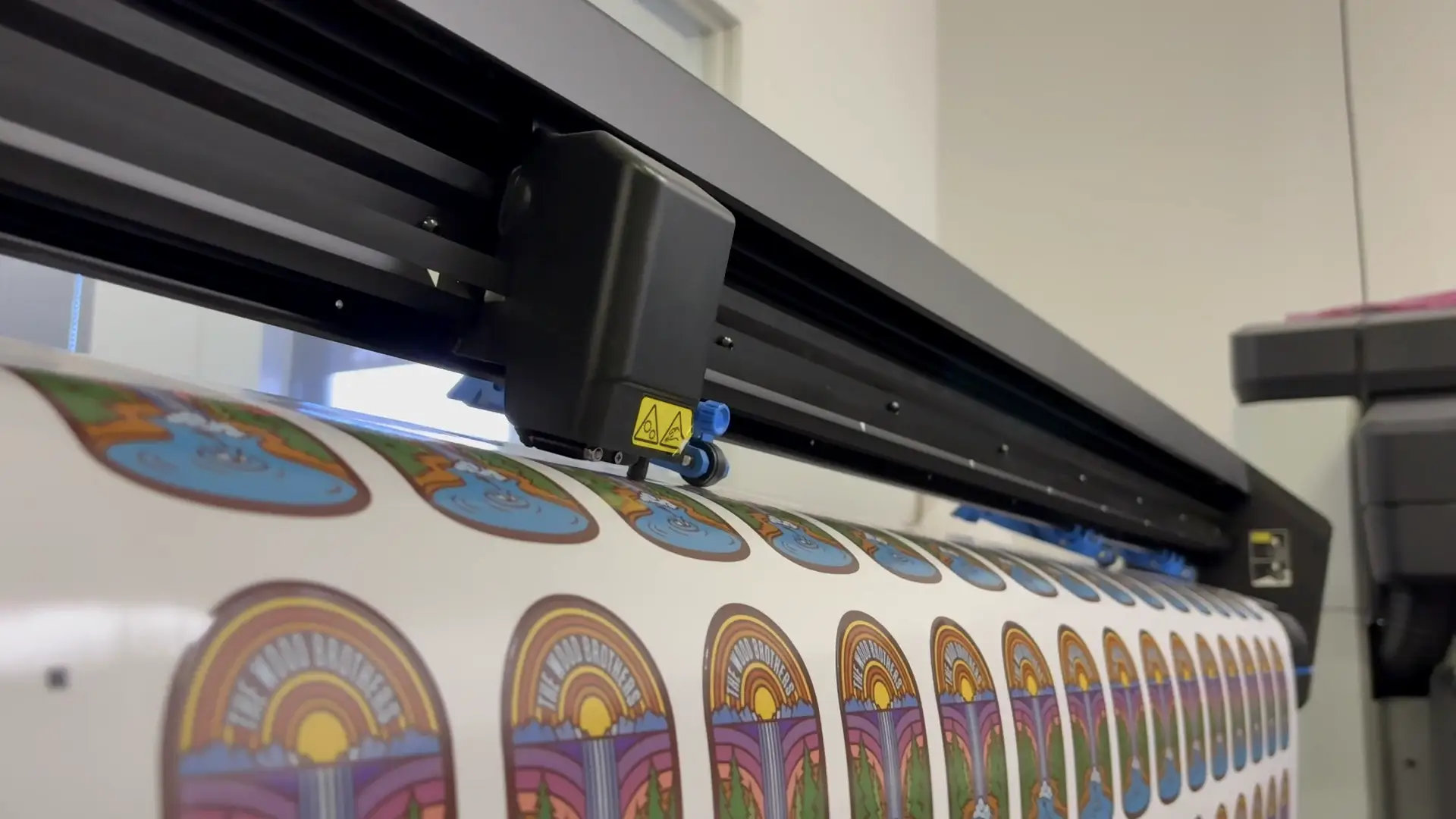 Wood Brothers stickers coming off of the plotter